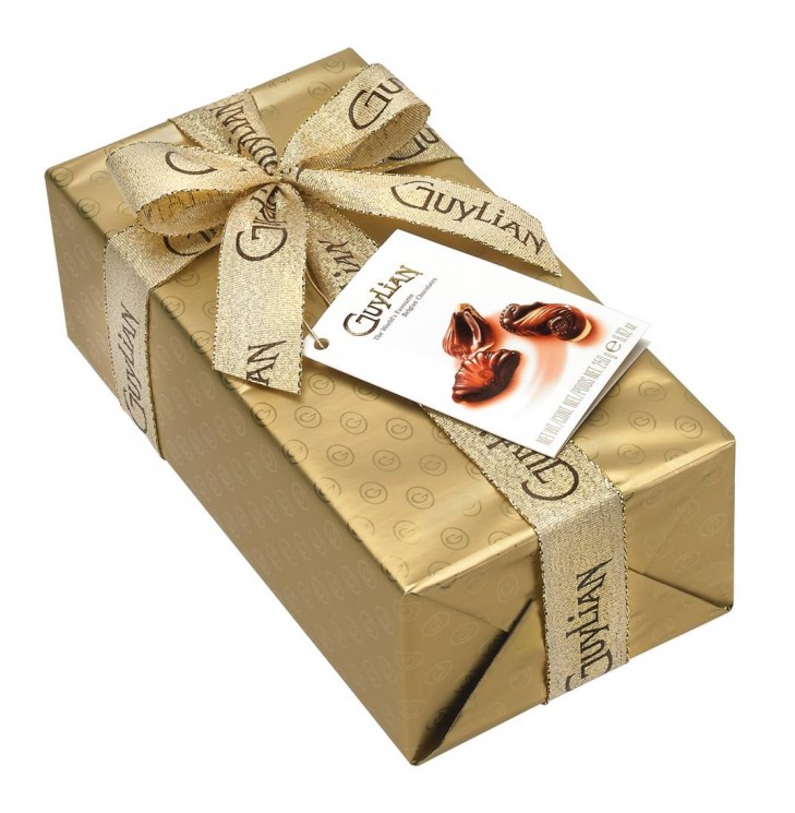 Guylian  Морские ракушки золотой сундучок с бантом 250г подарочная упаковка 